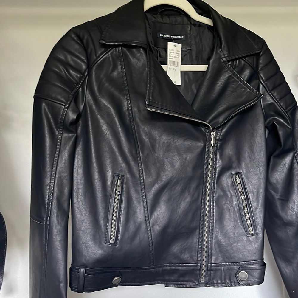 Black crop biker style jacket.